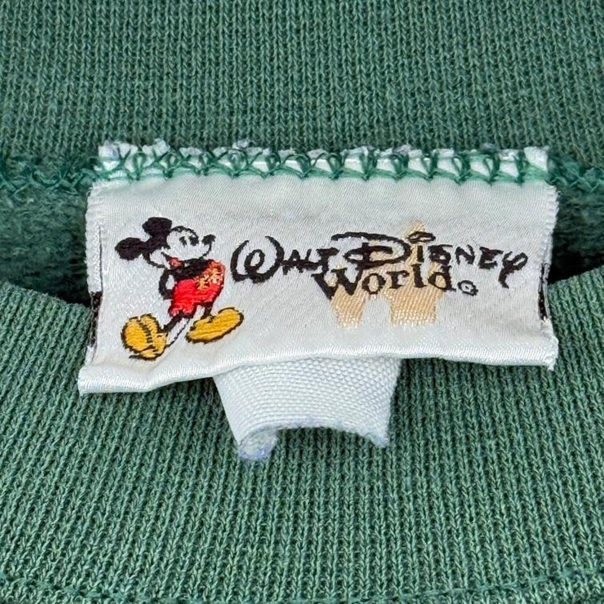 Vintage 00s Walt DIsney World Embossed Green Sweatshirt (L)